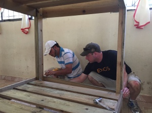 Rich and Jose finishing a bunk bed.